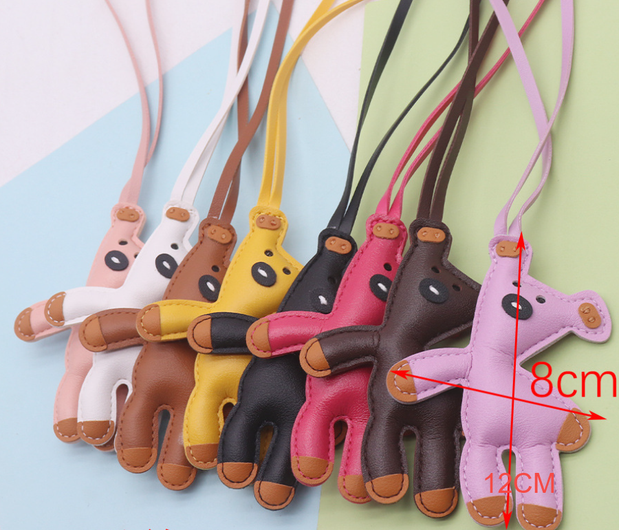Colorful leather bear bag charms in brown black pink yellow red white and green