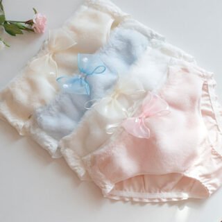 Soft plush mid-waist panties in light yellow, white, light blue and pink with bow details