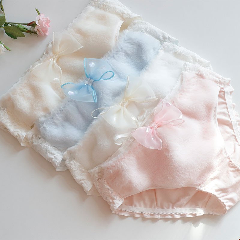 Soft plush mid-waist panties in light yellow, white, light blue and pink with bow details