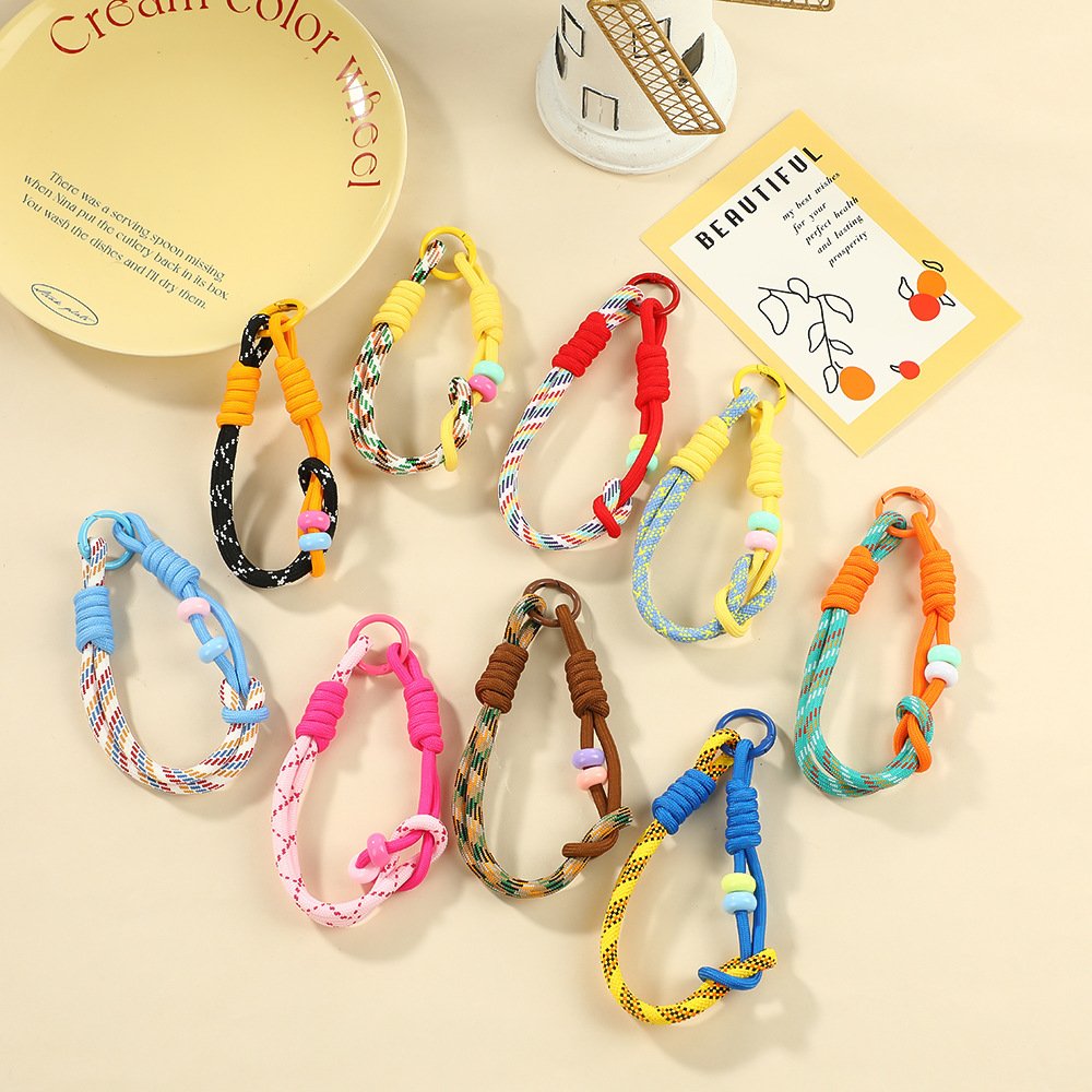 Colorful braided double-ring phone wrist straps in multiple colors